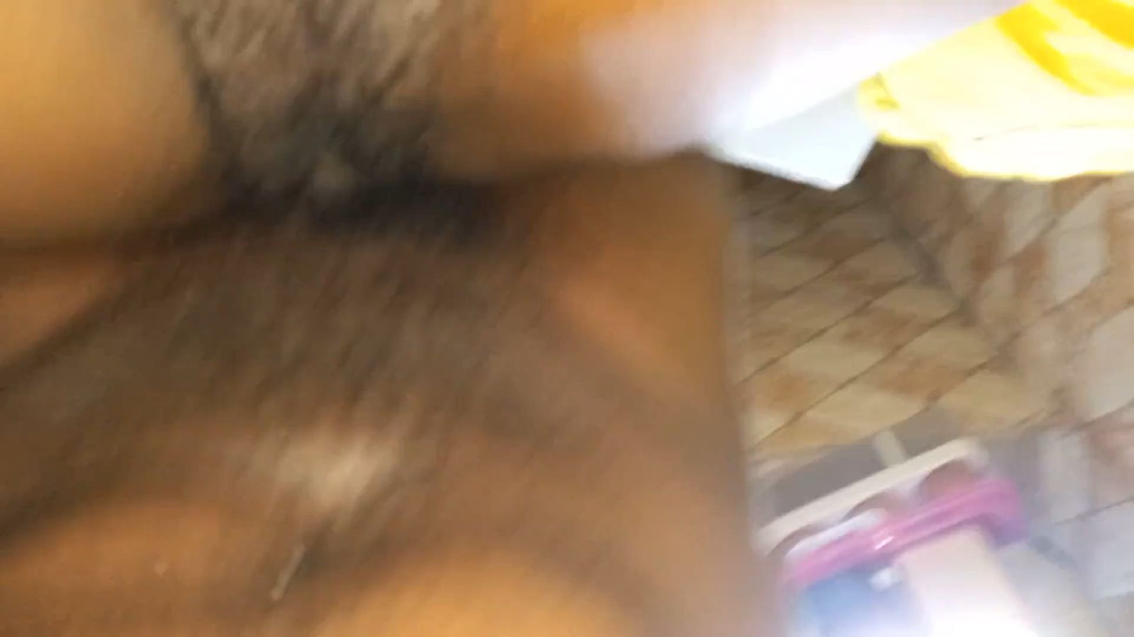 Close short zulu girl ontop of a fridge