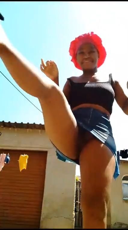 Kasi Teen dances and shows pussy outside