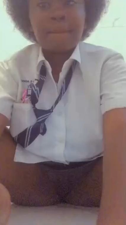 Cross eyed schoolgirl plays with her pussy